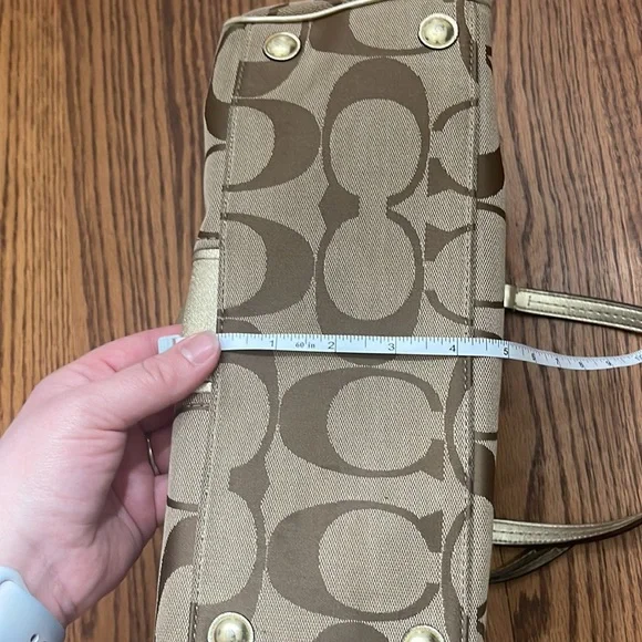Gold coach purse